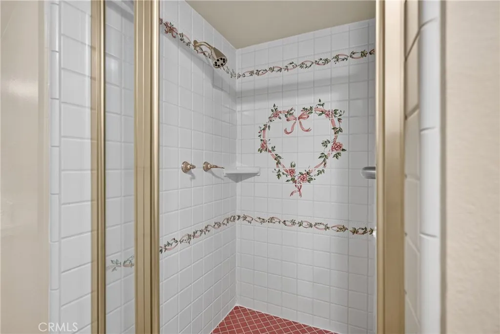 Charming artisan detailing on tile in shower
