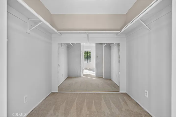 Walk in closet in Upstairs bedroom 1