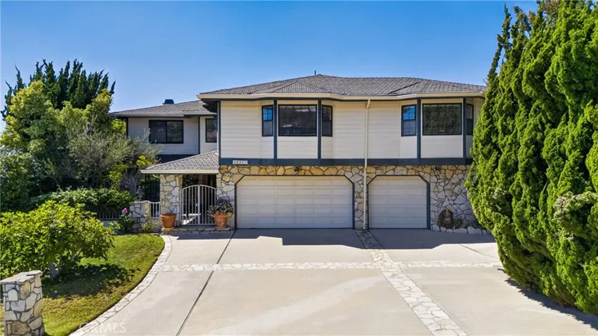 Front Exterior- spacious home with 3 car garage