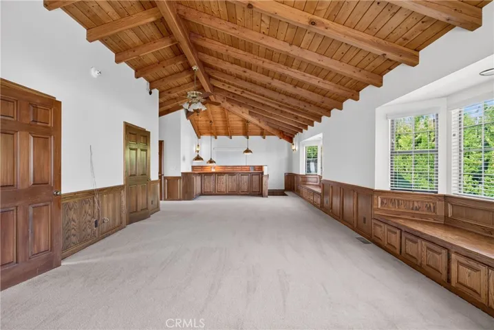 Upstairs Den/ Flexible Space with vaulted ceilings, bay windows, reading nooks, built in storage