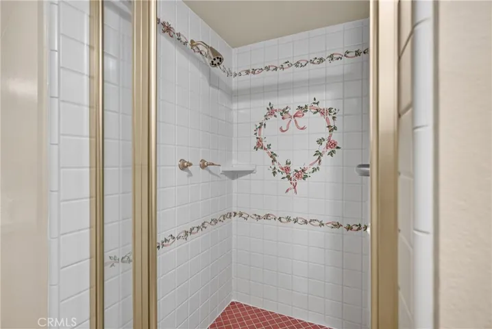 Charming artisan detailing on tile in shower