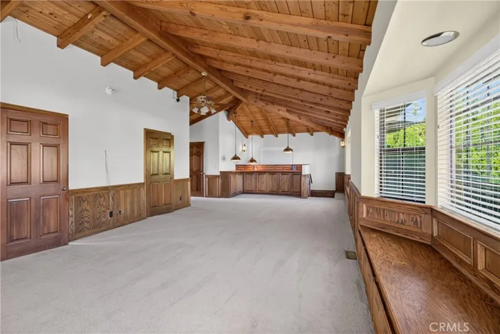 Upstairs Den/ Flexible Space with vaulted ceilings, bay windows, reading nooks, built in storage