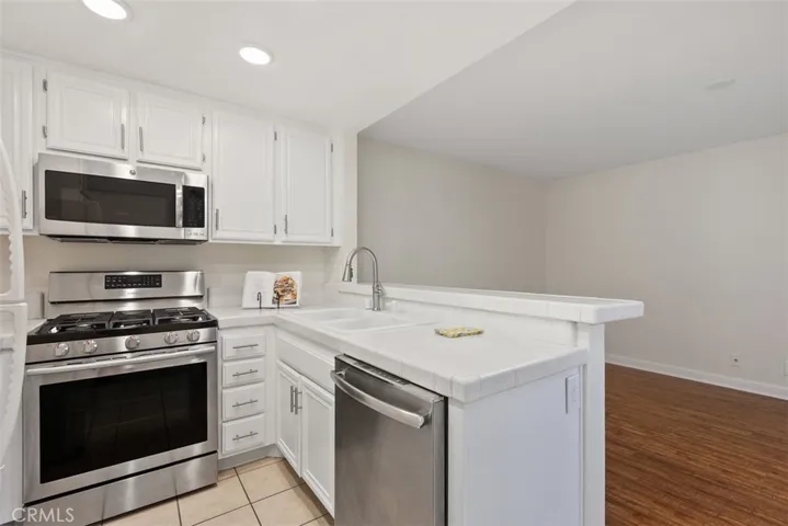 New stainless oven/range, microwave, dishwasher