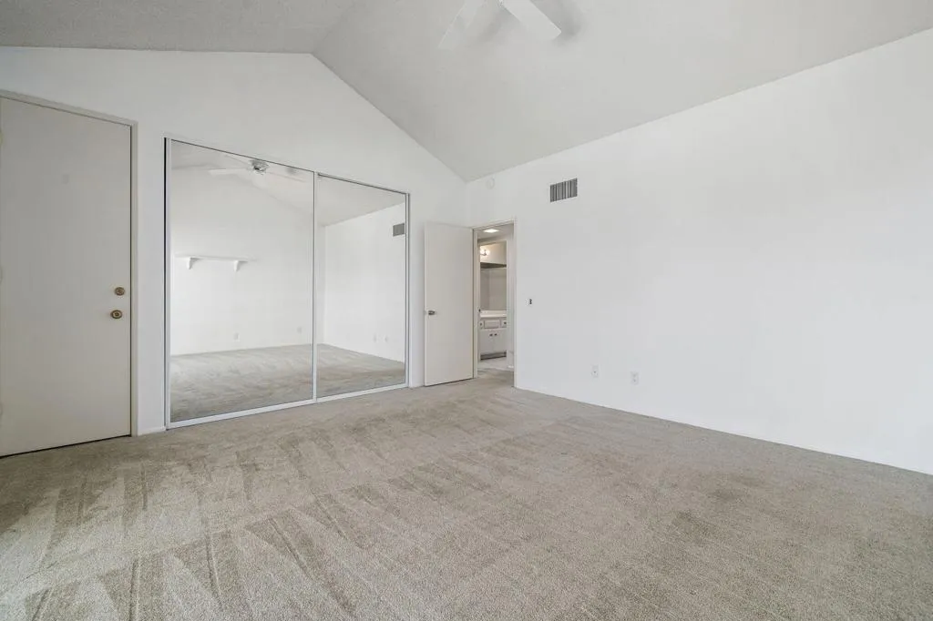Guest bedroom with high ceiling