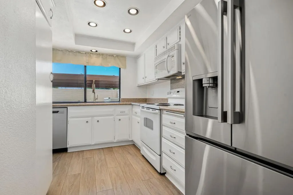 Kitchen with new fridge & dishwasher