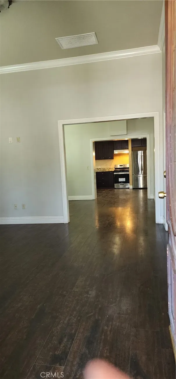unit #1 address 3112 View from entry leading to formal living  room and formal dining room to the kitchen.
