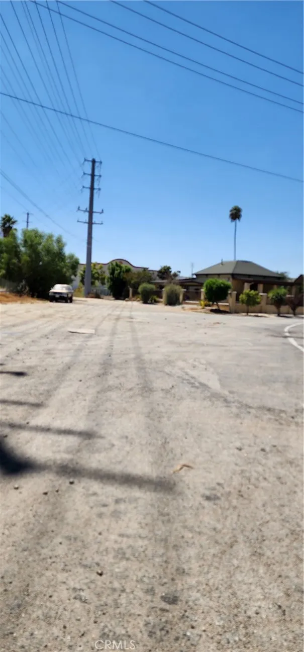 Side entry leading to the property. Non-dedicated Commerce St. Access to back of the lot with ample street parking. Not a through street.