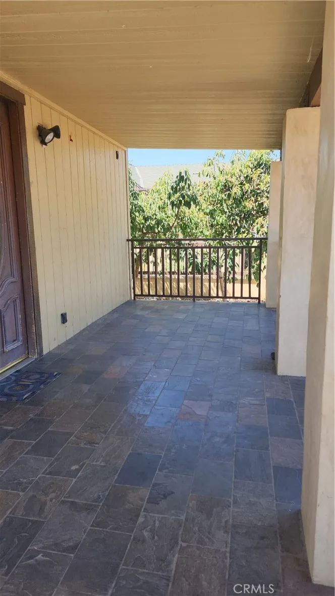 unit #1 address 3112 view of front porch.
