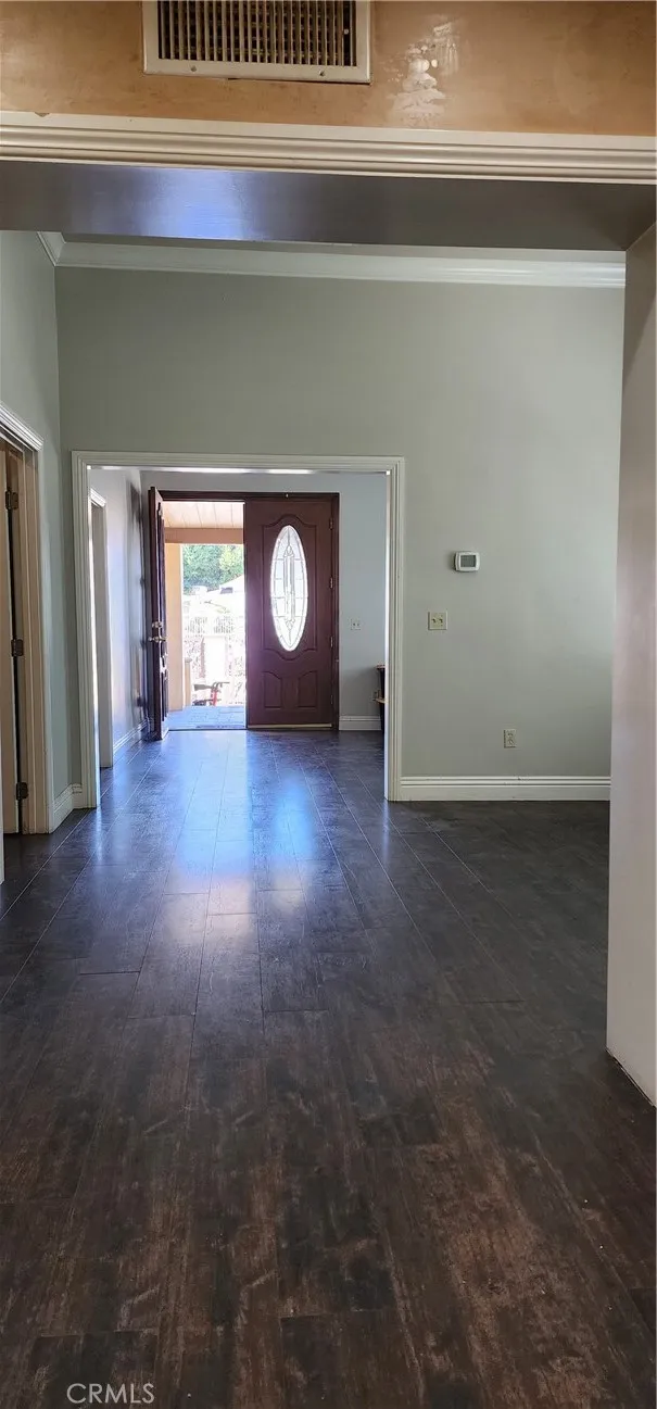 unit #1 address 3112 view from the kitchen to facing the front to the formal dining room and formal living room.