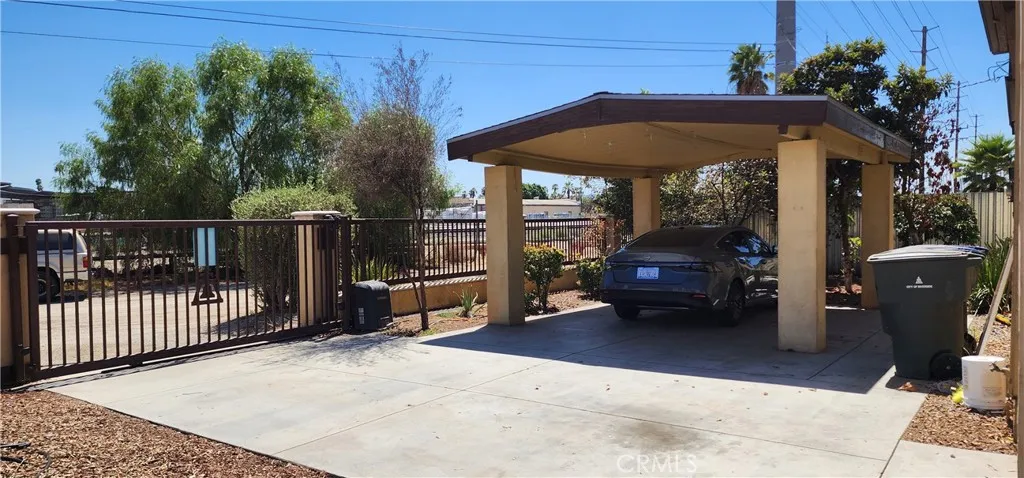 unit #1 address 3112 Private remote access gate, carport and room for approx 3 vehicles