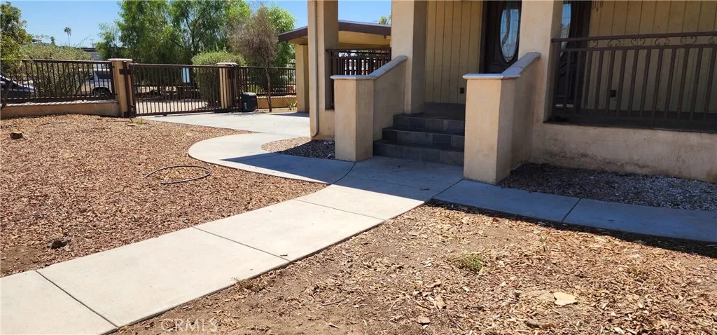 unit #1 address 3112 large individual private yard, own remote access gate, and carport. Parking for approx 3 vehicles total