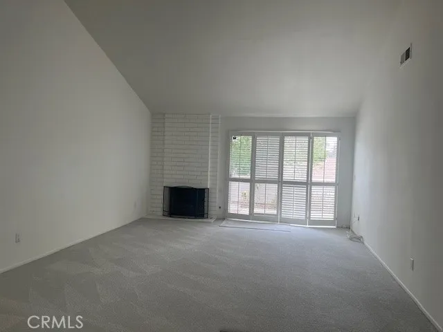 Combo living/dining with access to rear patio Combo living/dining with access to rear patio