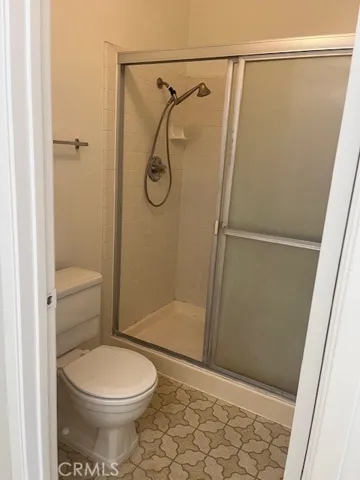 Rear bath with shower