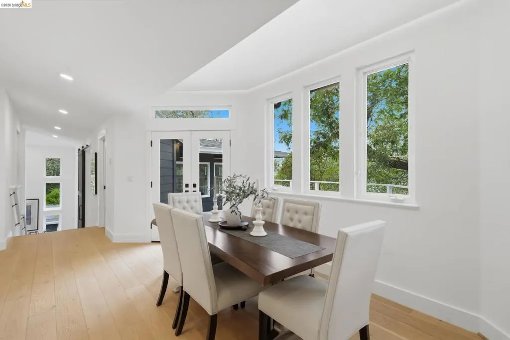 Light wood-finish flooring with white walls Light wood-finish flooring with white walls