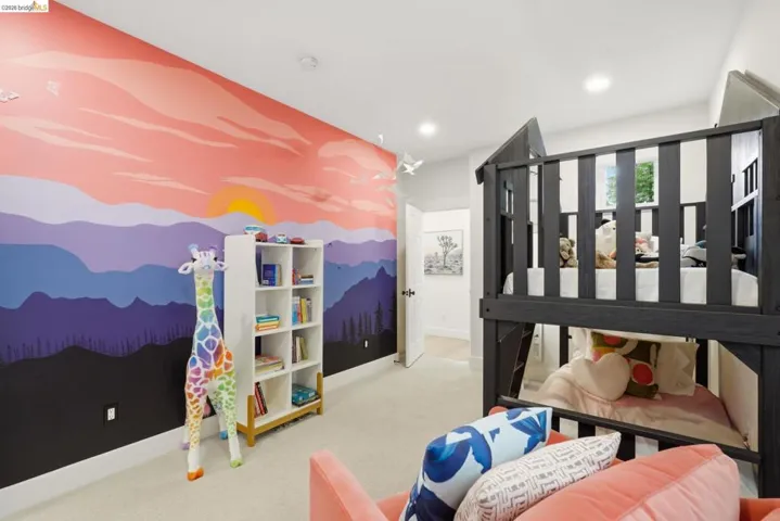 Room featuring a vibrant accent wall mural