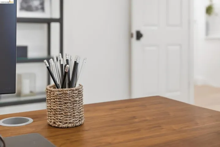 Wood-finish desktop with a built-in cable grommet