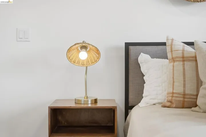 Upholstered headboard with dark frame