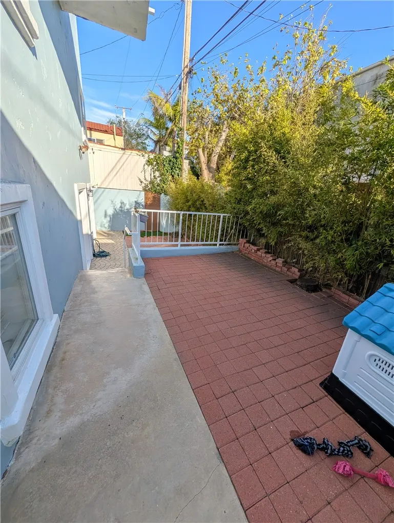 Private backyard patio offering a peaceful outdoor space for relaxing or entertaining.