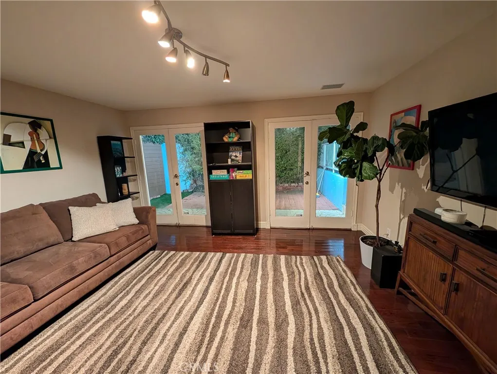 Spacious Den offering abundant natural light and plenty of space for relaxing or entertaining.
