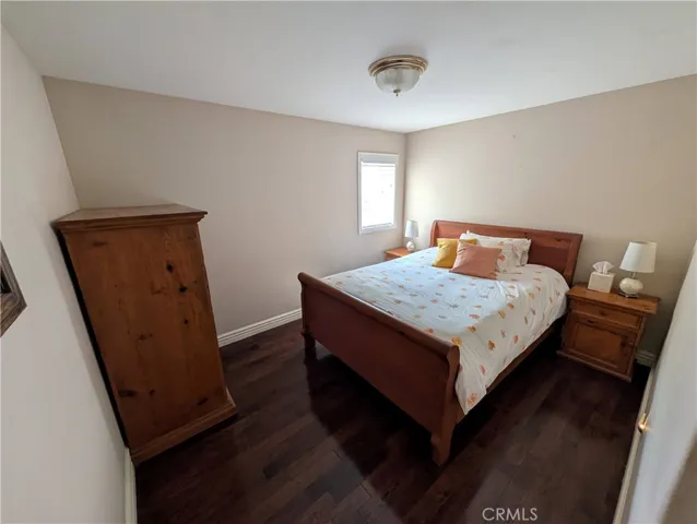 Private first-floor bedroom offering a comfortable retreat for guest, multigenerational living or a home office.