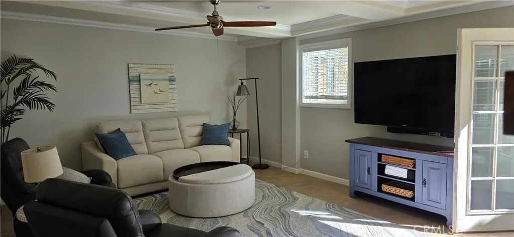 Family Room Also has Large Smart TV, and double door entrance to beautiful gardens and patio