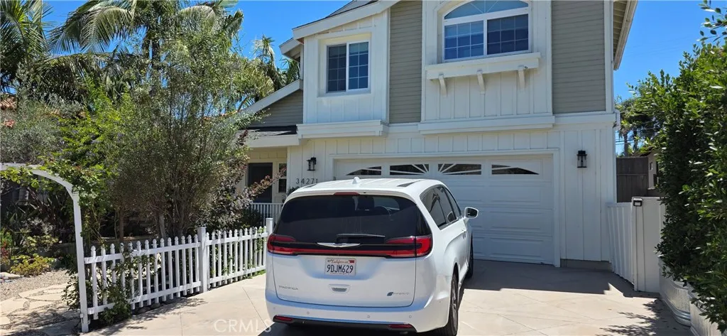 2 Car Garage, Driveway will accommodate 2 cars + on street parking