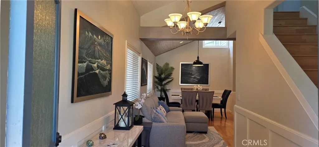 Separate Entry leads to Living Rm Seating and DR Area.. Stairway to upper level