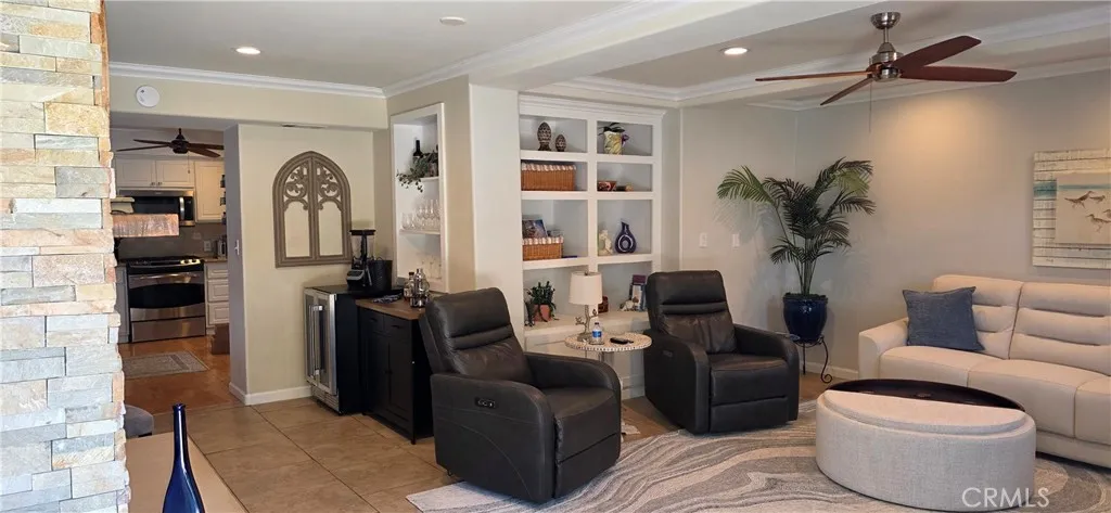 Spacious family room with electronic recliners, queen sleeper, Wine Refrig Bar