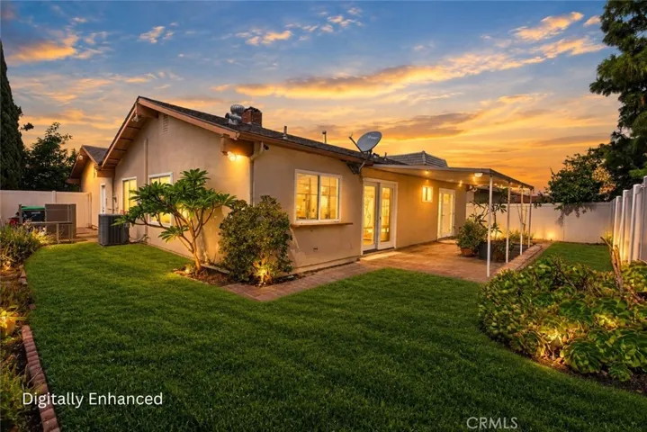 Backyard - Digitally Enhanced with twilight sky, grass, lights in windows & yard