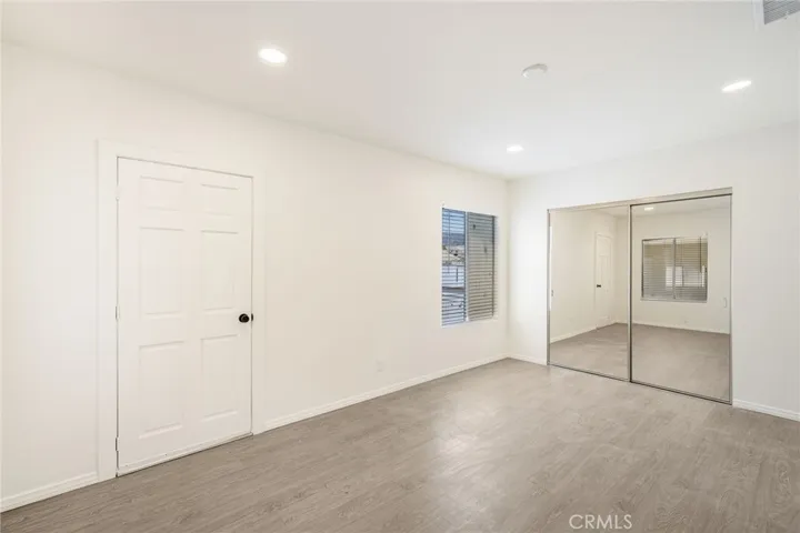 Primary bedroom 4 with its exit to backyard