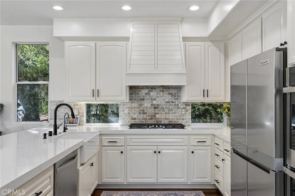 Chef’s kitchen showcasing refined finishes and exceptional design.