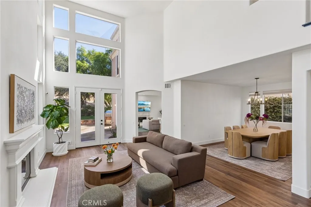 Grand living area with soaring ceilings and refined luxury.