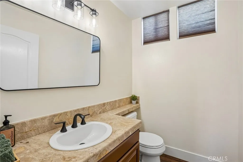 Stylish Jack-and-Jill bathroom connecting two bedrooms with a spacious and functional layout.
