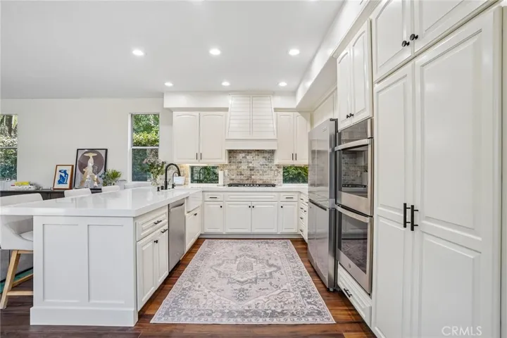 Chef’s kitchen showcasing refined finishes and exceptional design.