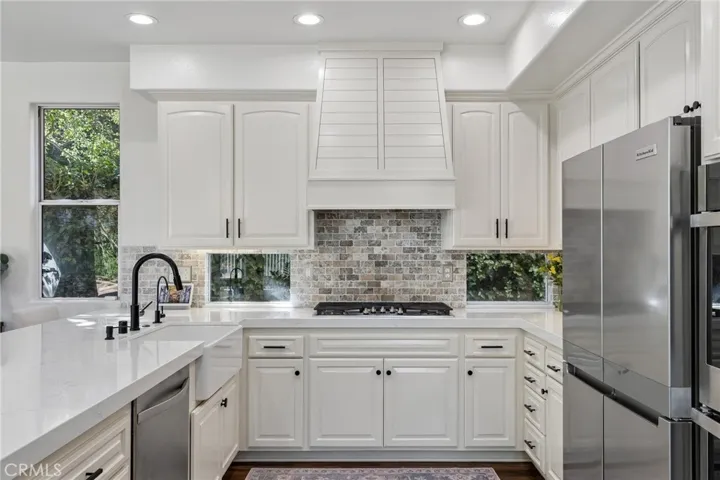Chef’s kitchen showcasing refined finishes and exceptional design.