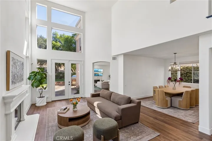 Grand living area with soaring ceilings and refined luxury.