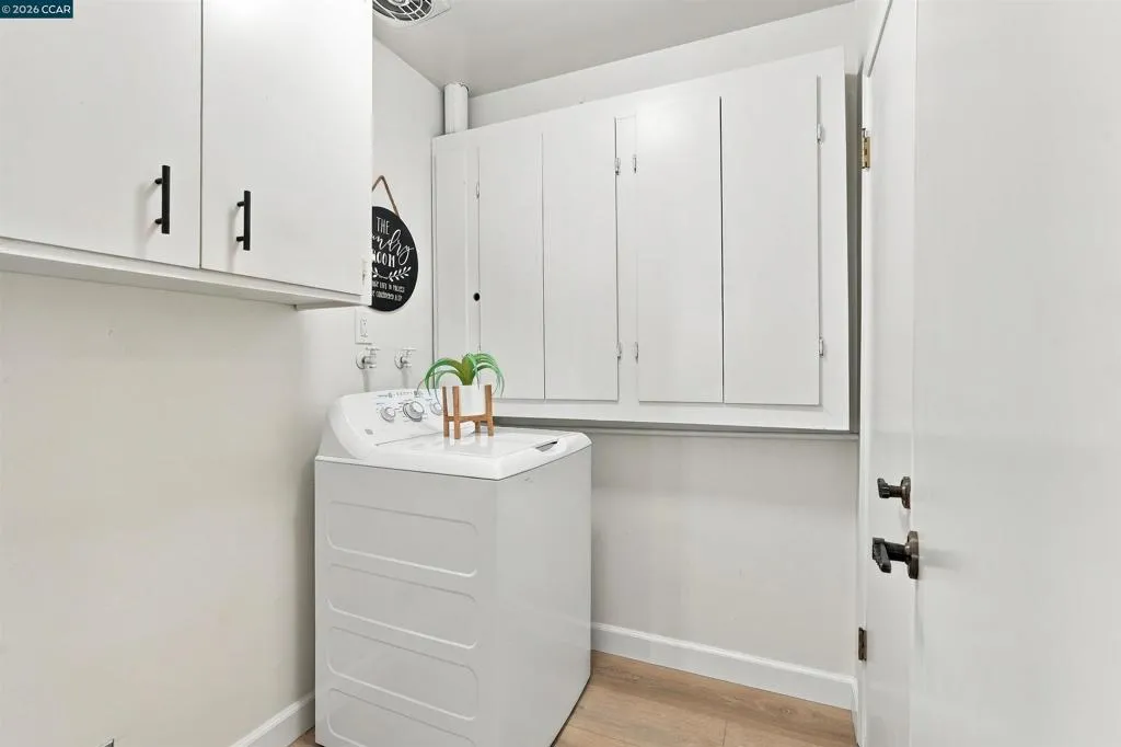 Laundry room with storage