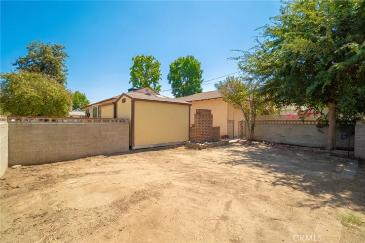 Backyard with full block wall