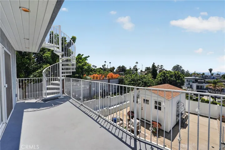Main floor deck with spiral staircase leading to the 3rd floor