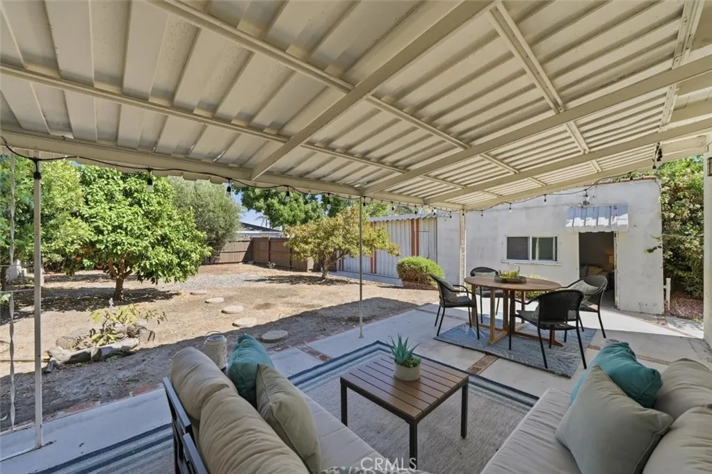 Covered porch in backyard