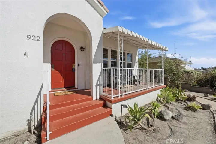 Front porch with awning faces west