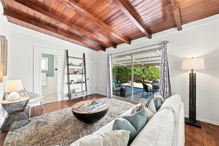 Family room with access to backyard via sliding door