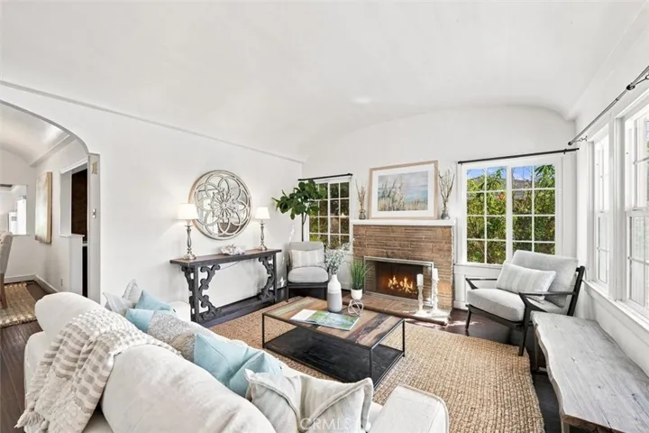 Living room receives fantastic natural light. Fire in fireplace is virtually enhanced, BTV