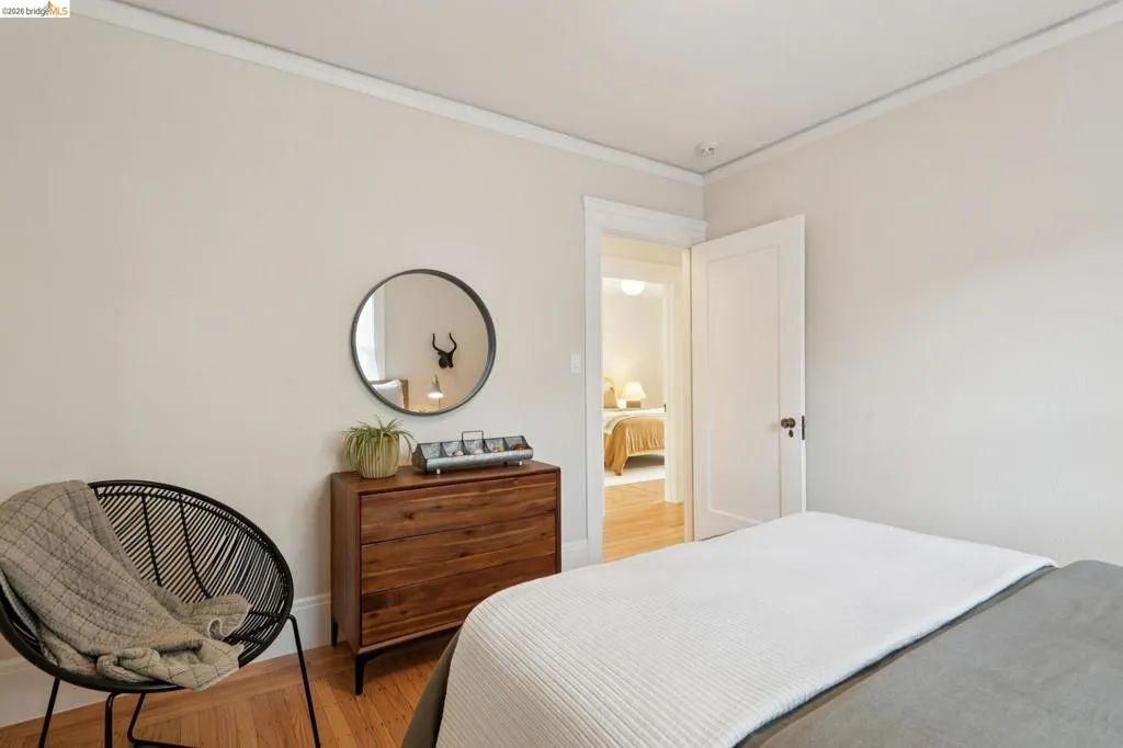 Hardwood flooring, crown molding, solid core interior door, wood-finish dresser, recessed lighting Hardwood flooring, crown molding, solid core interior door, wood-finish dresser, recessed lighting