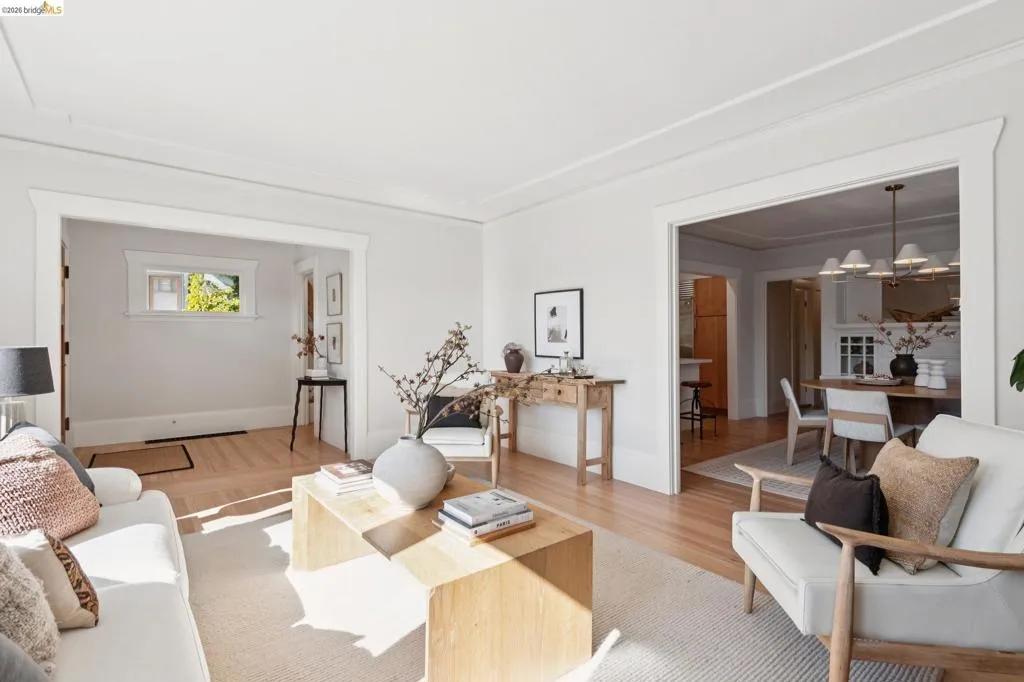 Light wood-finish flooring, white walls, and a recessed ceiling panel create a bright interior Light wood-finish flooring, white walls, and a recessed ceiling panel create a bright interior