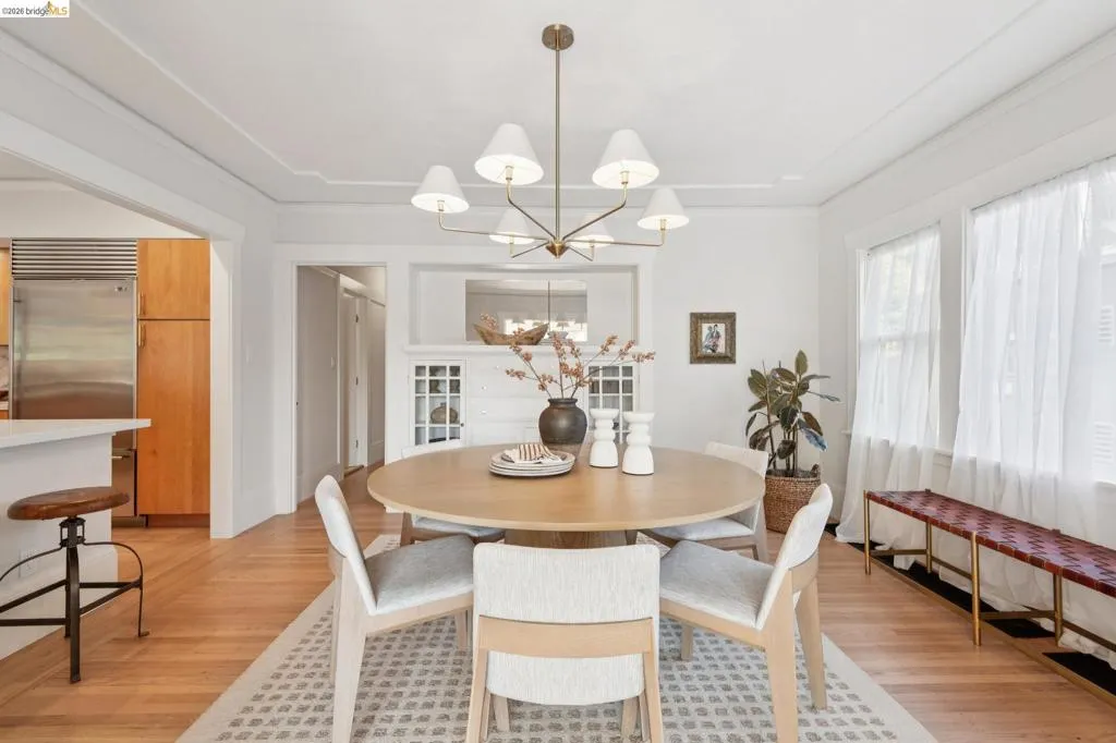 Recessed ceiling detail, wood-finish flooring, built-in cabinetry, stainless steel appliance, multiple large windows Recessed ceiling detail, wood-finish flooring, built-in cabinetry, stainless steel appliance, multiple large windows