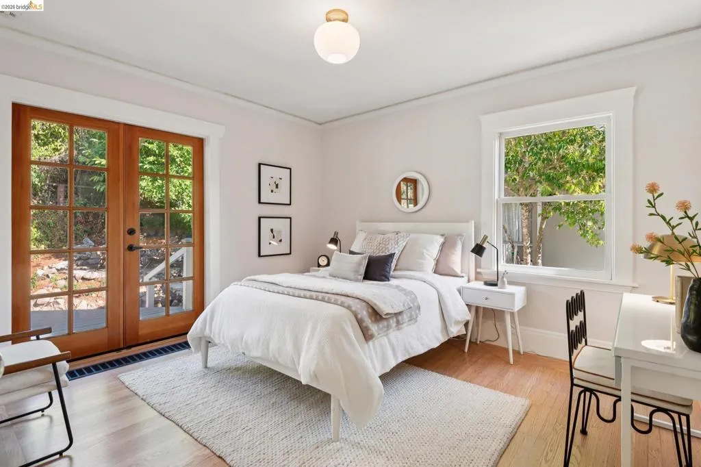 Wood-finish flooring, white walls, and crown molding Wood-finish flooring, white walls, and crown molding