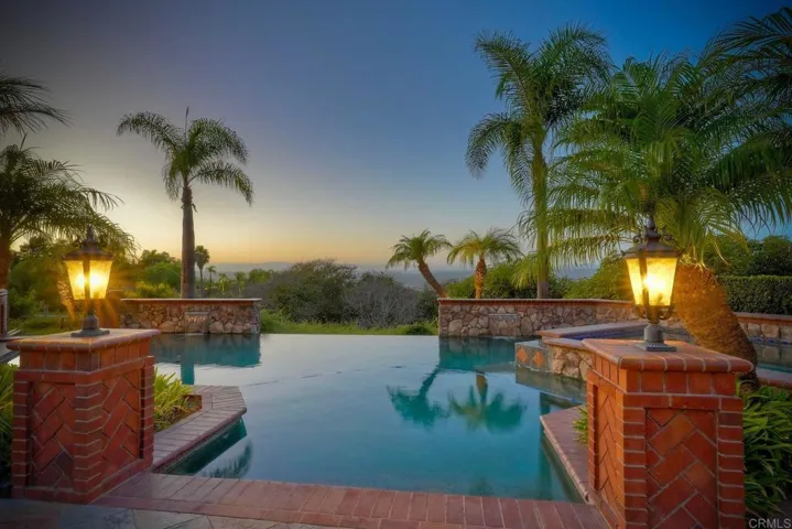 Dramatic pool entry with stunning views