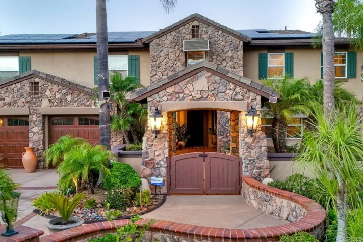 Private courtyard entry with bubbling fountain await you