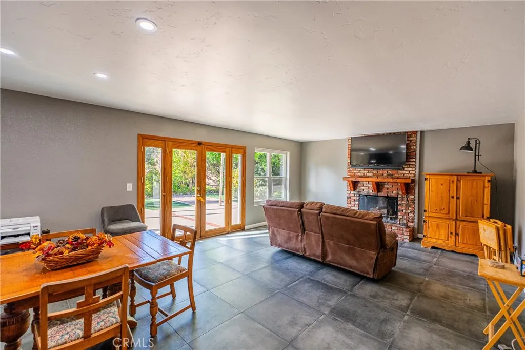 Living room with double doors leading to outside Living room with double doors leading to outside